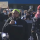 The Hall family speaks at a protest in Warren, Mich., on Sept. 19, 2020. An unidentified perpetrator threw a brick threw the window of their house and shot into their living room in an apparent hate crime.